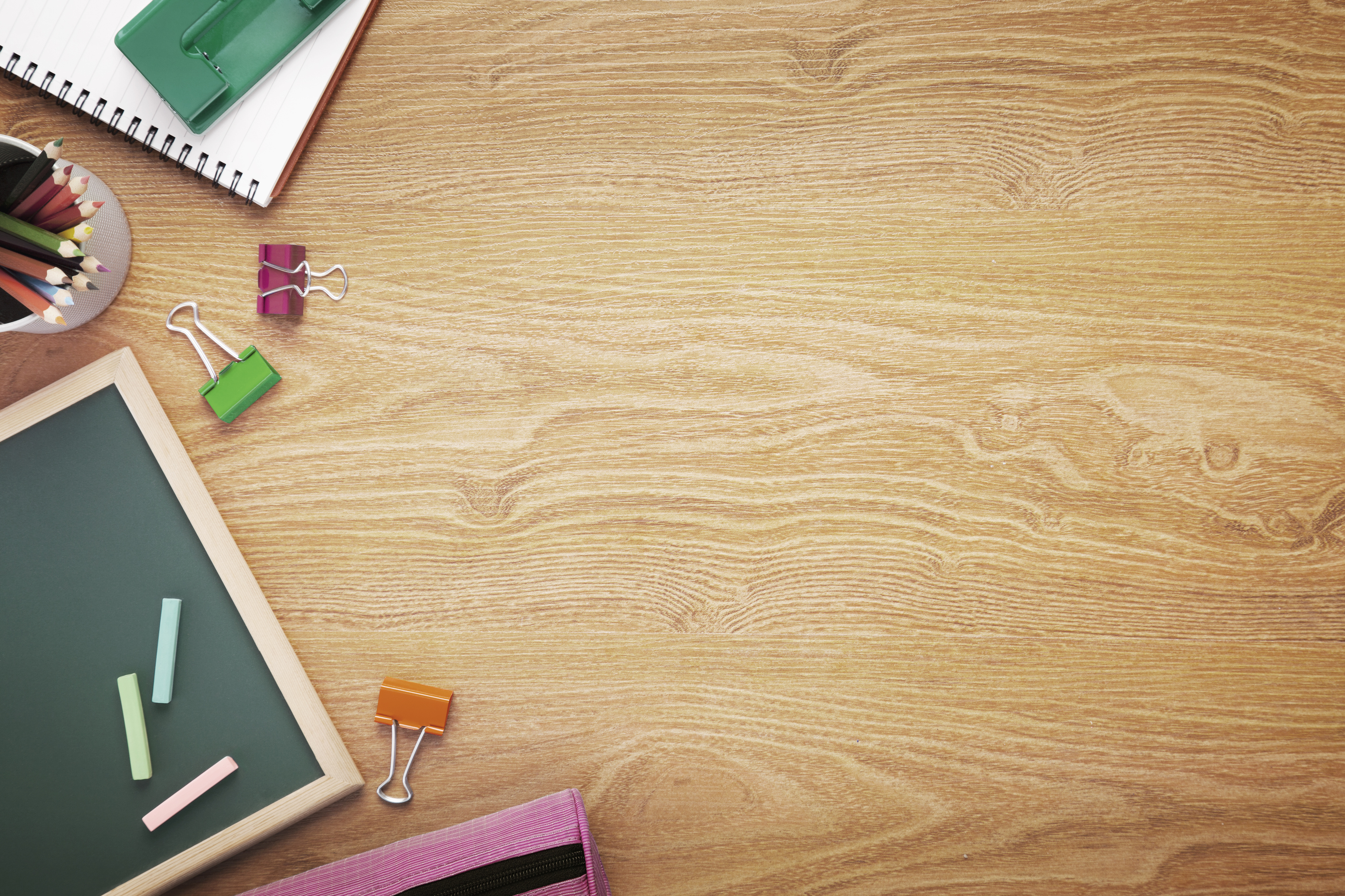 School supplies on desk background with copy space